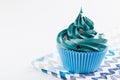 Blue cupcake with stars glitter sprinkles Royalty Free Stock Photo