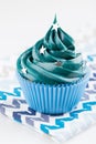 Blue cupcake with stars sprinkles Royalty Free Stock Photo