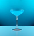 Blue Curacao cocktail garnished with orange slice, in the style of bold color field Royalty Free Stock Photo