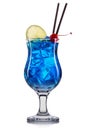 Blue curacao cocktail with lime and cherry isolated on white background Royalty Free Stock Photo