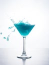 Blue curacao cocktail with splash Royalty Free Stock Photo