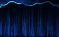 Blue curtain of luxurious velvet on the theater stage. Copy space. The concept of music and theatrical art
