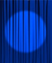 Blue curtain with a spotlight