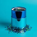Blue Cylinder with Sequins Spilling Out Royalty Free Stock Photo