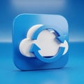 A blue 3D icon depicting a white cloud with two blue arrows forming a circle around it Royalty Free Stock Photo