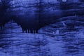 Blue dark abstract background with flowing paint
