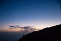 Blue dark night Sky with Shining Moon above Teide Mountain, Tenerife, Spain