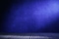 Blue dark room with spotlight, empty stage with copy space Royalty Free Stock Photo