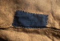 Blue-darned bag. Rough canvas, burlap, sackcloth close up Royalty Free Stock Photo