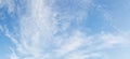 Blue day sky background with tiny clouds, panorama Royalty Free Stock Photo