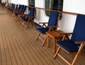 Deck chairs lined up on deck deck of a cruise ship Royalty Free Stock Photo