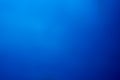 Blue defocused abstract smooth asymmetric gradient background