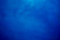 Blue defocused abstract smooth asymmetric gradient background