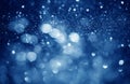 Blue defocused glitter background with copy space