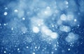 Blue defocused glitter background with copy space