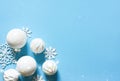 Blue delicate Christmas background with white balls. Bokeh lights. New Year`s decor. Gifts Royalty Free Stock Photo