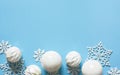 Blue delicate Christmas background with white balls. Bokeh lights. New Year`s decor. Gifts Royalty Free Stock Photo