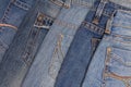 Blue denim background, pile of jeans, back side Royalty Free Stock Photo
