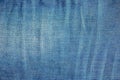 Blue denim background. Texture of classic frayed jeans Royalty Free Stock Photo