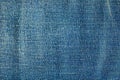 Blue denim background. Texture of classic frayed jeans Royalty Free Stock Photo