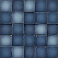 Blue denim fabric arranged in checkerboard pattern. Squares of jeans material visible stitching. Textured background resembles Royalty Free Stock Photo
