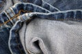 Blue denim fabric with visible details. textura or background