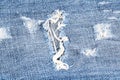 Blue denim jeans hole macro Royalty Free Stock Photo