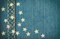 Blue denim textural background, jeans belt, stars