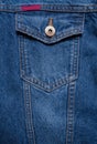 Blue denim texture. Closeup of denim jacket elements. Background for banner, poster or adrift Royalty Free Stock Photo