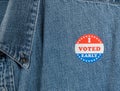 Blue denim working clothing with I Voted Early sticker