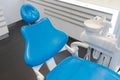 Blue dental chair in the modern dentistry office. Royalty Free Stock Photo