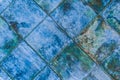 Blue diagonal square ceramic floor tiles with abstract pattern, mosaic texture background Royalty Free Stock Photo