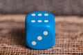 Blue dice on table.Social game