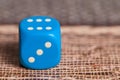 Blue dice on table.Social game