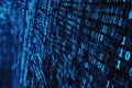 Blue digital binary code streaming on a computer screen, creating a futuristic and high-tech background Royalty Free Stock Photo