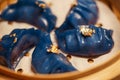 Blue Dim Sum chinese cuisine in bamboo steamer and pot. Top view fresh dumplings with hot steams on wood plate with Royalty Free Stock Photo