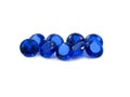 Blue sapphires on a white background Royalty Free Stock Photo