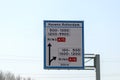 Blue direction and information sign for the directions on Motorway A16 to the Harbours Royalty Free Stock Photo