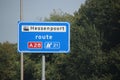 Blue direction sign heading Hessenpoort route A28 in Ziwolle