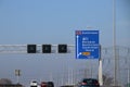 Blue direction sign on motorway A12 heading to Den Haag and Zoetermeer in the Netherlands