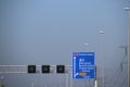 Blue direction sign on motorway A12 heading to Den Haag and Zoetermeer in the Netherlands