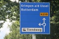 Blue direction sign on N210 road heading to Rotterdam Royalty Free Stock Photo