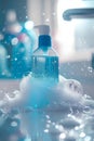 Blue dish soap bottle amidst soap suds and water sparkle. Royalty Free Stock Photo