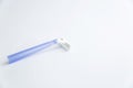 Blue disposable razor on a white background Royalty Free Stock Photo