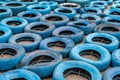 Blue disused tyres on the ground