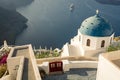 Blue dome church in Imerovigli village, photo taken in the morning Royalty Free Stock Photo