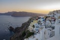 Blue dome church landmark view of a Mediterranean coastal landscape in Santorini