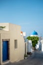 Blue dome church in Megalochori village, Santorini island, Greece Royalty Free Stock Photo