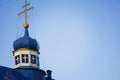 Blue dome with a gold cross of the old Orthodox Church. the blue roof of the Church against the sky Royalty Free Stock Photo