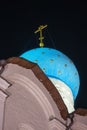 The blue dome of the Orthodox Church with a gold cross and stars against the background of the night sky Royalty Free Stock Photo